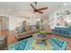 Cozy living room with hardwood floors, stylish decor, and an open view to the modern kitchen at 4305 Twenty Grand Dr, Indian Trail, NC 28079