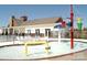 Community splash pad with colorful features next to a community clubhouse at 4305 Twenty Grand Dr, Indian Trail, NC 28079