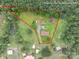 Aerial view of property lines surrounding the lot, showing a yard and outbuildings at 4373 Wentz Rd, Maiden, NC 28650