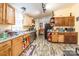 Well-lit kitchen with ample counter space, wooden cabinetry, and modern appliances at 4373 Wentz Rd, Maiden, NC 28650