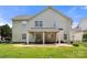 This home has a lush backyard with a covered patio and ample room for outdoor seating at 4764 Brockton Nw Ct, Concord, NC 28027
