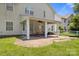 This home has a beautiful backyard with a covered patio at 4764 Brockton Nw Ct, Concord, NC 28027