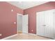 Bedroom showcasing neutral walls, closet, and open doorway for convenient access at 4764 Brockton Nw Ct, Concord, NC 28027