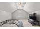 Spacious bedroom features a high ceiling, fan, and large window for ample light at 4764 Brockton Nw Ct, Concord, NC 28027