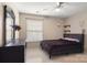 Cozy bedroom featuring a comfortable bed, modern decor, and plenty of natural light at 4764 Brockton Nw Ct, Concord, NC 28027