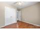 Bedroom features closet with white doors and neutral walls for a clean aesthetic at 4764 Brockton Nw Ct, Concord, NC 28027