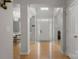Grand foyer with hardwood floors, modern lighting, and an inviting entryway to the home at 4764 Brockton Nw Ct, Concord, NC 28027