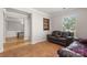 Comfortable living room with tile floors, complemented by a view into the adjacent dining area at 4764 Brockton Nw Ct, Concord, NC 28027