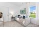 Bright bedroom with a comfy daybed, stylish decor, and a view of the outdoors at 492 Switch St # 82 Ty, York, SC 29745