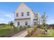 Beautiful two-story home with a well-manicured lawn and landscaping that accentuates the white exterior at 492 Switch St # 82 Ty, York, SC 29745