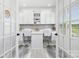 Bright home office with built-in cabinets, dual workstations, and French doors for privacy at 492 Switch St # 82 Ty, York, SC 29745