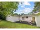 An inviting backyard with a brick patio and fresh landscaping provides a relaxing outdoor space at 4929 Prentice Pl, Charlotte, NC 28210