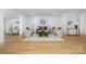 Cozy living room with hardwood floors, neutral tones, stylish furniture, and ample natural light at 4929 Prentice Pl, Charlotte, NC 28210