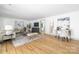 Spacious living room features hardwood floors, stylish decor, and a comfortable seating area at 4929 Prentice Pl, Charlotte, NC 28210