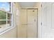 Bathroom shower with glass door and window at 5410 Berryview Ln, Gastonia, NC 28056