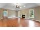 Inviting living room with fireplace, French door, and hardwood flooring at 5410 Berryview Ln, Gastonia, NC 28056