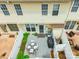 Aerial view of private fenced-in patio with table, chairs and BBQ grill at 5623 Fetzer Nw Ave, Concord, NC 28027