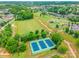 Aerial view showcasing tennis courts, sports fields and recreational area at 5623 Fetzer Nw Ave, Concord, NC 28027