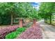 Afton Village entrance with lush landscaping and brick pillars at 5623 Fetzer Nw Ave, Concord, NC 28027