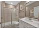 Modern bathroom with a glass-enclosed shower and white vanity at 7046 North Bridge Dr, Huntersville, NC 28078