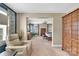 Spacious primary bedroom featuring an ensuite sitting area, with large windows and natural light at 7046 North Bridge Dr, Huntersville, NC 28078