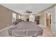 Spacious game room with plush seating, entertainment center, and pool table, perfect for leisure and entertainment at 7046 North Bridge Dr, Huntersville, NC 28078