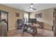 Bright office featuring a ceiling fan, desk, and neutral walls, perfect for a productive workspace at 7046 North Bridge Dr, Huntersville, NC 28078
