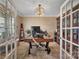 A home office with a large desk, natural light, and plenty of storage at 7046 North Bridge Dr, Huntersville, NC 28078