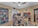 Office with desk, bookshelf, and neutral walls creating an organized and functional work environment at 7046 North Bridge Dr, Huntersville, NC 28078
