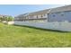 Backyard with a privacy fence and lush green grass at 709 Volta Nw Dr, Concord, NC 28027