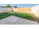 Backyard featuring a small patio and lush green grass at 709 Volta Nw Dr, Concord, NC 28027
