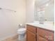 Bathroom featuring a single vanity and toilet at 709 Volta Nw Dr, Concord, NC 28027
