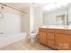 Full bathroom featuring a double vanity, bathtub and shower at 709 Volta Nw Dr, Concord, NC 28027
