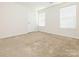 Bedroom with neutral carpet, and door to hall at 709 Volta Nw Dr, Concord, NC 28027