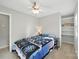 Bedroom features a ceiling fan and built-in shelving at 7344 Maitland Ln, Charlotte, NC 28215