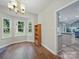 Charming dining area with beautiful hardwood floors and natural light at 7344 Maitland Ln, Charlotte, NC 28215