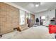 A spacious garage offers ample storage, featuring a brick accent wall and access to the home's interior at 739 Springdale Rd, Rock Hill, SC 29730