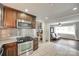 Well-lit kitchen with stainless steel appliances and a view of the living room at 739 Springdale Rd, Rock Hill, SC 29730