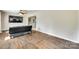 Bright living room with hardwood floors, a ceiling fan, and plenty of natural light at 739 Springdale Rd, Rock Hill, SC 29730