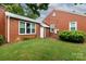 The brick exterior of this home is framed by a large back yard at 761 Milton Ave, Rock Hill, SC 29730