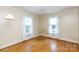 Bedroom featuring hardwood flooring, and natural lighting from the two windows at 761 Milton Ave, Rock Hill, SC 29730