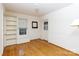 Bedroom featuring hardwood floors, built-in shelving, and natural light at 761 Milton Ave, Rock Hill, SC 29730