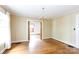 Dining room with patterned walls, hardwood floors, and chandelier at 761 Milton Ave, Rock Hill, SC 29730