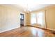 Dining room with patterned walls, hardwood floors, and chandelier at 761 Milton Ave, Rock Hill, SC 29730