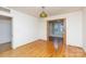Living room featuring hardwood flooring and large opening to bring in natural light at 761 Milton Ave, Rock Hill, SC 29730
