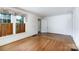 Empty living room featuring hardwood floors and bright windows at 761 Milton Ave, Rock Hill, SC 29730
