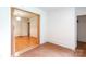 Bright living room featuring hardwood style flooring and white painted brick walls at 761 Milton Ave, Rock Hill, SC 29730