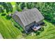 Aerial view of a home with well-maintained lawn and outdoor wood deck at 7916 Deerbridge St, Mint Hill, NC 28227