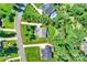 Aerial shot showcasing the property's layout, including the landscaped yard and surrounding neighborhood at 7916 Deerbridge St, Mint Hill, NC 28227