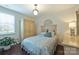 Cozy bedroom with hardwood floors, natural light, and closet at 7916 Deerbridge St, Mint Hill, NC 28227